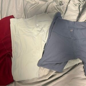 lululemon athletica woman’s Leggings in maroon,light teal(ish),and a Bluey gray.